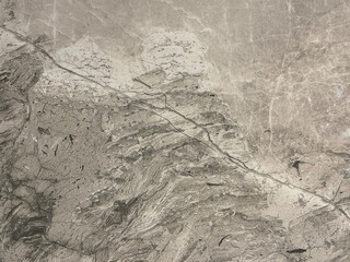 Natural brown grey marble with random abstract texture. Luxurious rare type light brown, white, beige, and grey natural marble stone, Seamless background texture.