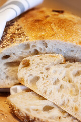 Homemade bread, sourdough wheat loaf with seeds