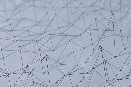 Abstract network of connected metal dots and lines.
