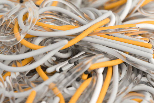 Close-up of tangled colored and transparent wires.
