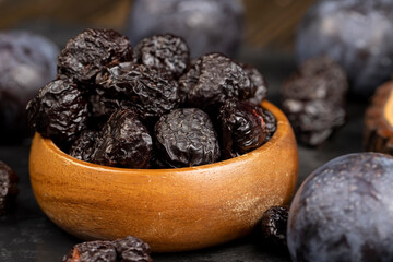ripe purple plums and dried plums