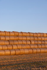 orange stacks from the sun during sunset at dusk