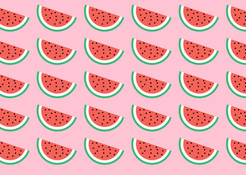 Watermelon slices arranged in a colorful repeating pattern on a pink background