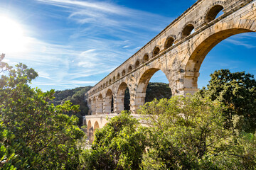 Pont du Gard Roman aqueduct in Occitanie France under a blue sky