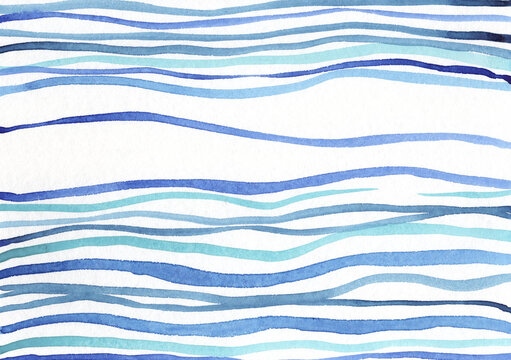 Abstract blue waves in watercolor on paper with a sea or ocean motif.