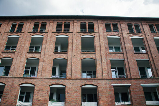 Facade of an old factory building converted into modern apartments in Germany