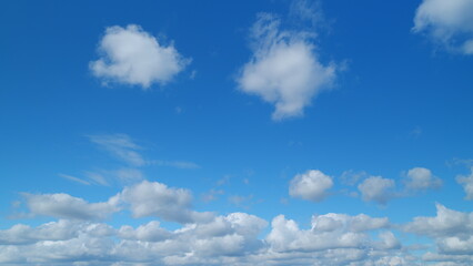 Clouds move in the blue sky. Running clouds against the blue sky. Timelapse.