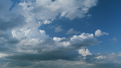 Obraz premium Gray cumulus rain dark clouds panoramic view. Massive dark rain storm clouds bg for weather forecast. Timelapse.