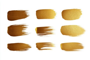 A set of gold brush strokes on a white background