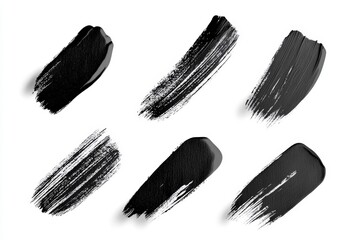 Six different brush strokes, all of which are black
