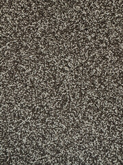 Close up texture of pebbles, small grey, white stone. Abstract colored background of natural material closeup. Light gray stone wall wide texture. 