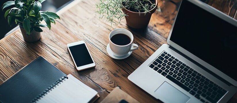 テーブルの上に置かれたガジェット機器の背景画像