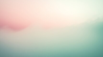 Obraz premium Soft, blurred background in shades of peach, yellow, and green.