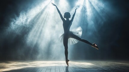 Obraz premium Graceful Ballet Dancer in Dramatic Lighting