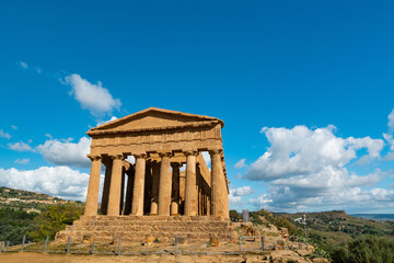 Fototapeta premium Ancient Greek Temple Ruins in Sicily, Italy Under Blue Sky
