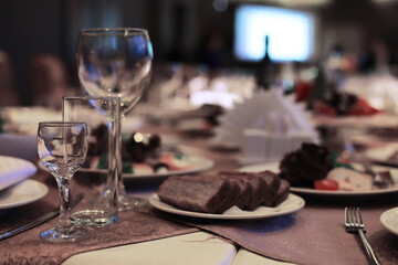 cutlery on the table in a restaurant table setting, knife, fork, spoon, interior