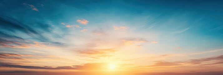 Vibrant sunset over a serene skyline with clouds and clear blue skies