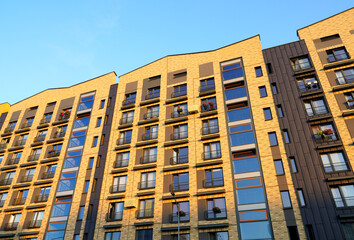 Modern facade building. Colorful high rise urban Modern house. Windows of Skyscraper. Architecture building exterior, window house block. High Rise house. Residential development in UK. City built. © MaxSafaniuk