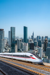 Majestic High-Speed Train in Urban Skyline with Towering Skyscrapers