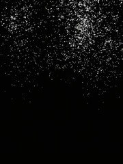 Obraz premium Shiny silver glitter on elegant black background creating a luxurious and sparkly effect, background