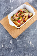 roasted vegetables with chicken and cheese