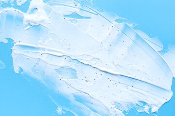 A smear of scrub on a light background. Beauty concept.