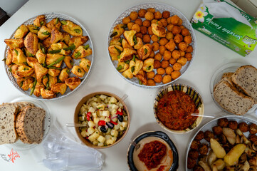 Delicious Buffet Table with Various Appetizers and Bread