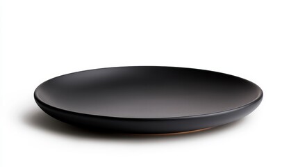 Modern Minimalist Black Plate on White Background for Elegant Dining, Display, and Presentation of Food in Contemporary Table Settings and Culinary Arts