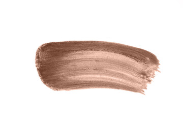 Fototapeta premium Pink shimmering lipstick texture stroke isolated on white background. Cosmetic product swatch. Color of the Year Mocha Mousse.