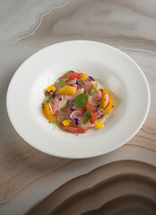 swordfish carpaccio with orange grapefruit radish and flowers