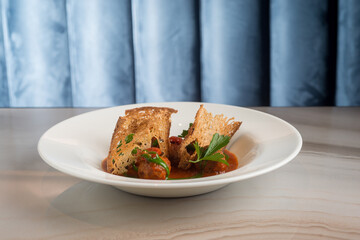 meatballs with tomato sauce and sliced toasted bread