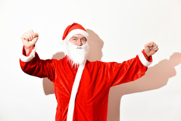 Portrait of Santa Claus dancing on white background , Christmas and New Year 2026
