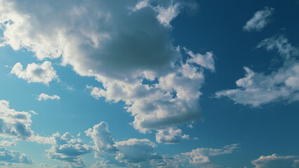 Puffy Fluffy White Clouds. Cumulus Cloud Cloudscape. White Fluffy Clouds Slowly Float Through Blue...