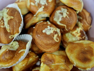 Pretzel rolls with cheese are a popular snack between meals
