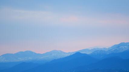 Clouds On The Mountains. Sunrise Over Forest In Fog. Mountain View With Sunrise. Pan.