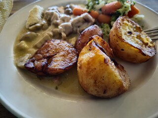 Potato and salad dish on a table