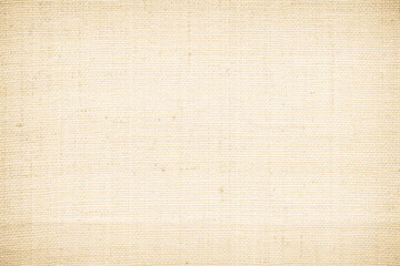 Closeup detail of beige fabric texture background. High resolution photo.