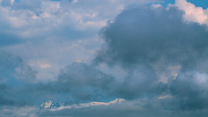 Snowy Mountains Near Kobuleti, Adjara, Georgia. Snowcapped Mountain Peaks Under Clouded Sky.