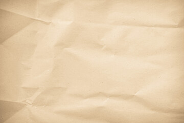 Crumpled brown paper texture background for design with copy space for text or image.