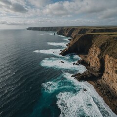 A cliffside view overlooking an endless sea with no boats or islands in sight.