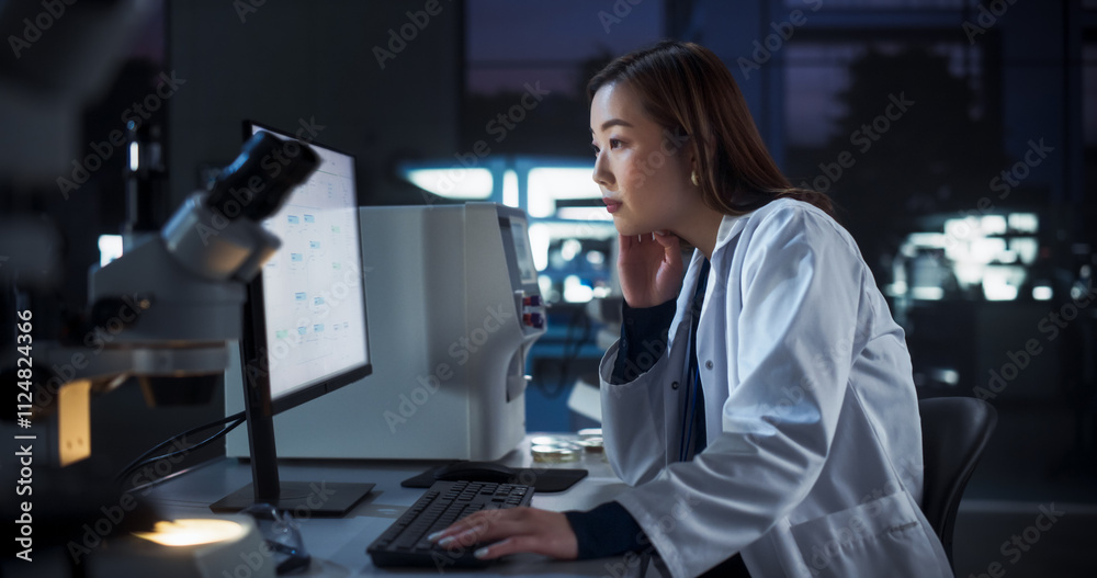 Poster medical research and development laboratory: tired japanese female scientist working on a computer w