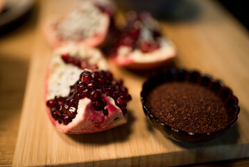 Fresh Pomegranate Seeds in a Cozy Kitchen — A Symbol of Healthy Cooking, Natural Ingredients, and Vibrant Flavors