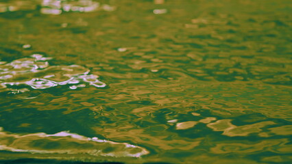Beautiful Pattern Of Water Reflecting Sun. Beautiful Ripples On Water. Shining Light From Sun On...