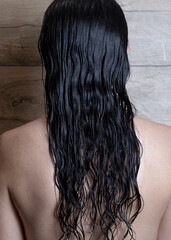 Fototapeta premium Dark curly hair after shower