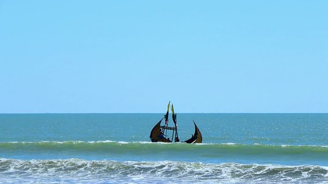  A boat is in the sea with big wave