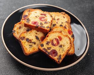 Fruit cake dessert sweet dried fruit traditional pastry, nuts meal food snack on the table copy space food background rustic top view
