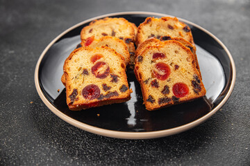 Fruit cake dessert sweet dried fruit traditional pastry, nuts meal food snack on the table copy space food background rustic top view