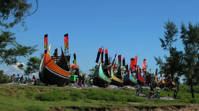 Some colorful fishing boat in the road