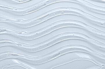 The texture of a cosmetic serum for the face with hyaluronic acid and collagen