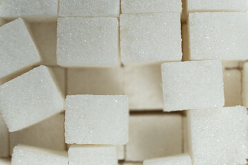 Cubes of white crystalline beetroot refined sugar.
